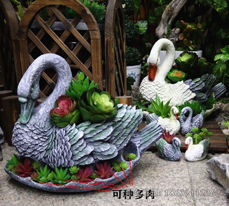 宜春不锈钢彩绘天鹅城市雕塑