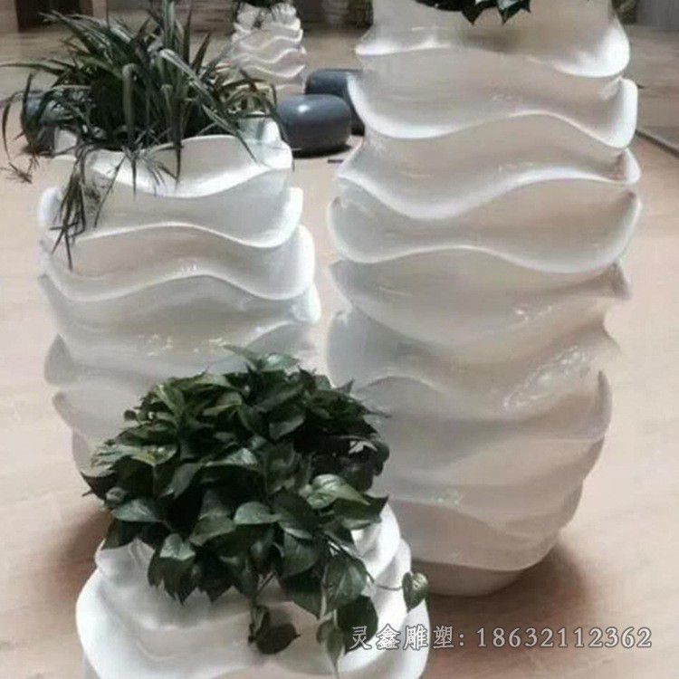 赣州抽象不锈钢花盆景观雕塑