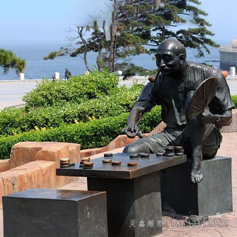 下象棋街边人物铜雕
