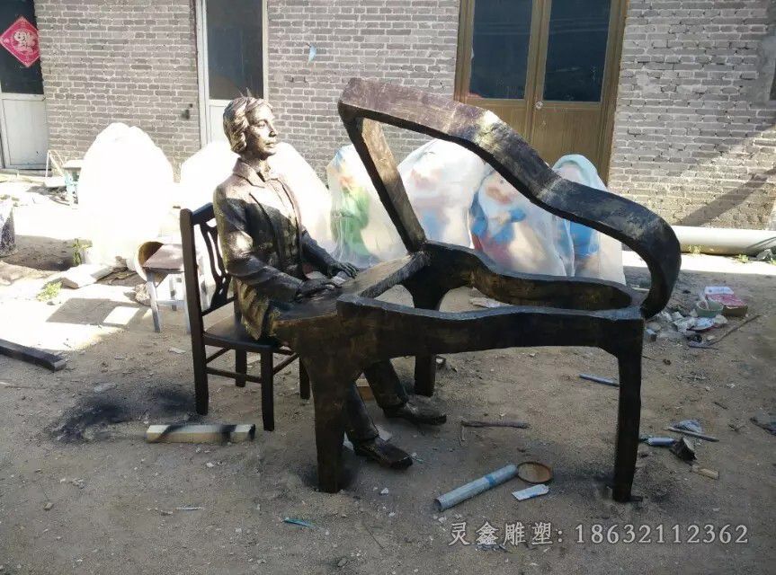 弹钢琴抽象人物校园铜雕