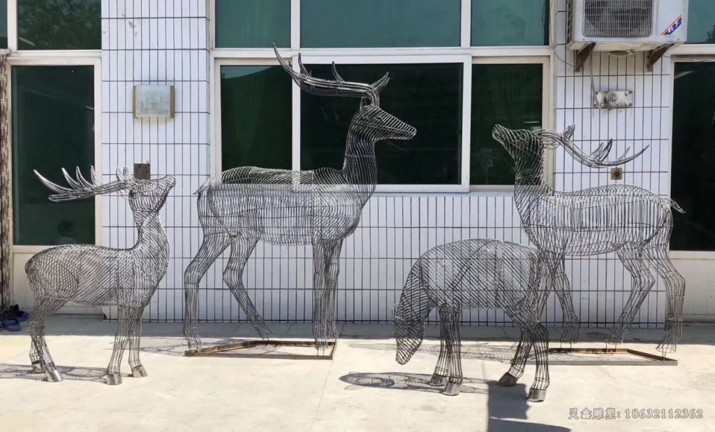 不锈钢镂空群鹿动物雕塑