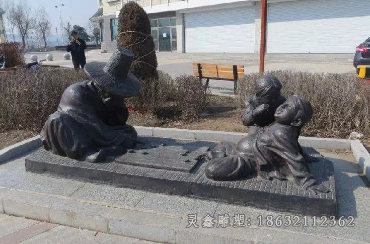路边下象棋人物铜雕